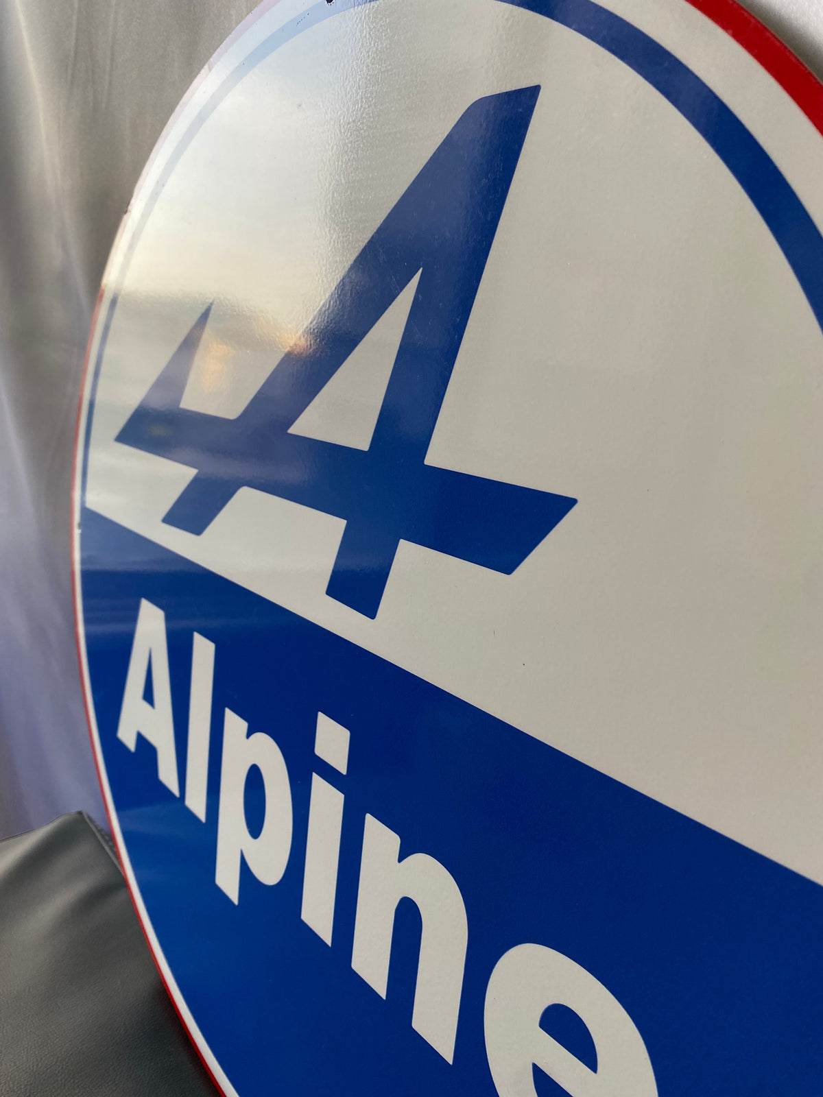 Alpine Round Heavy Metal Sign – Garage & Man Cave Decor